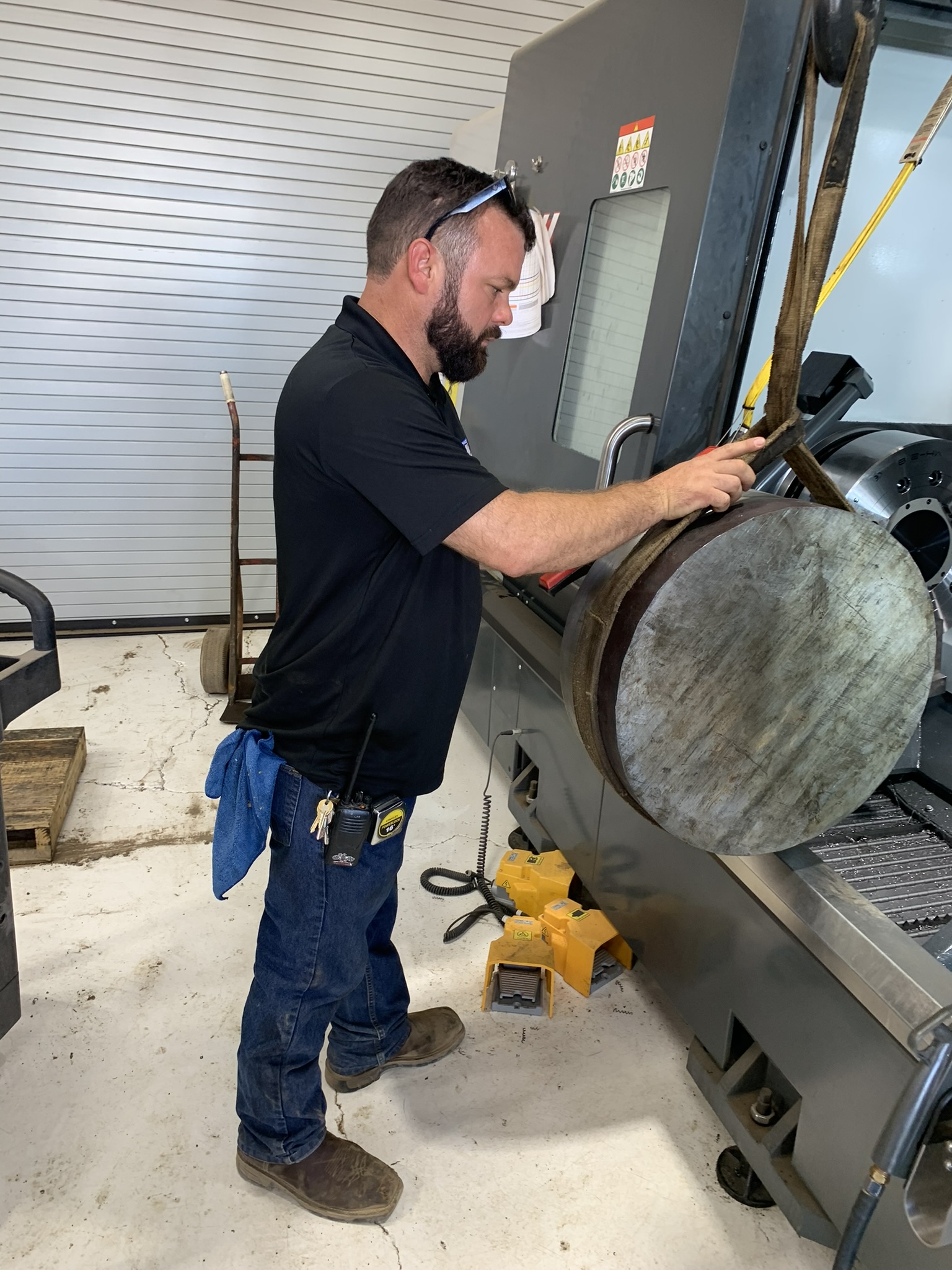 Man using machine for CNC fabrication